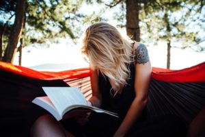 girl reading at daytime