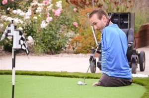 Nick Vujicic playing golf